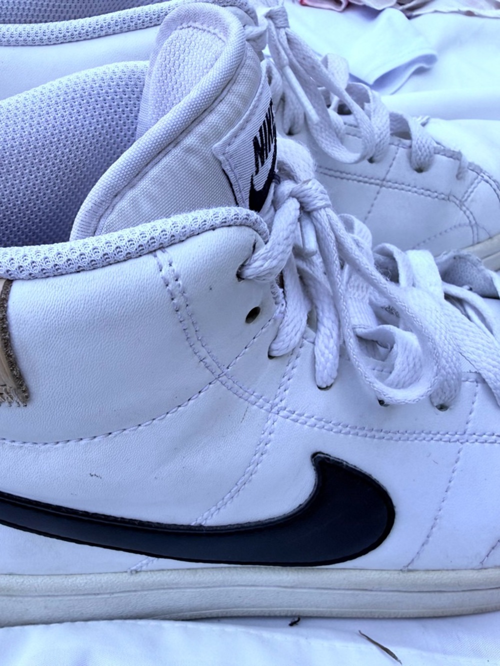 Nike White and Black Shoe Size Label Close-Up